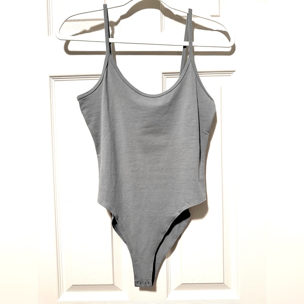 Super cute never worn Forever 21 Bodysuit.